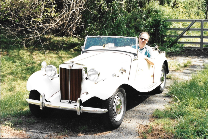 Mike Menaker in his beloved, and restored, MG Circa 1994